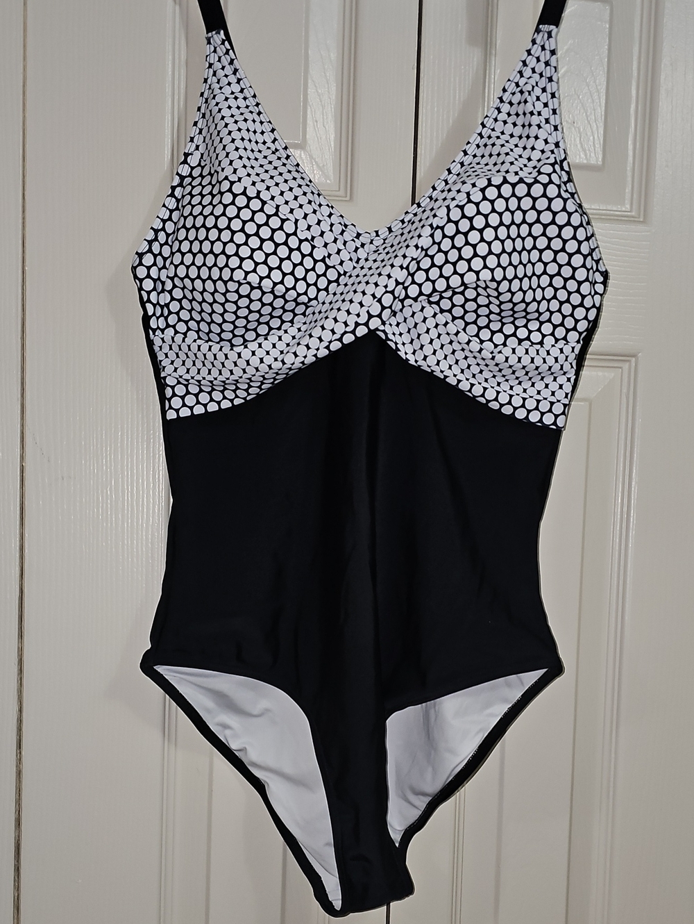 Black One-Piece Swimsuit with White Polka Dot Bust